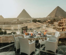 Cleopatra pyramids view